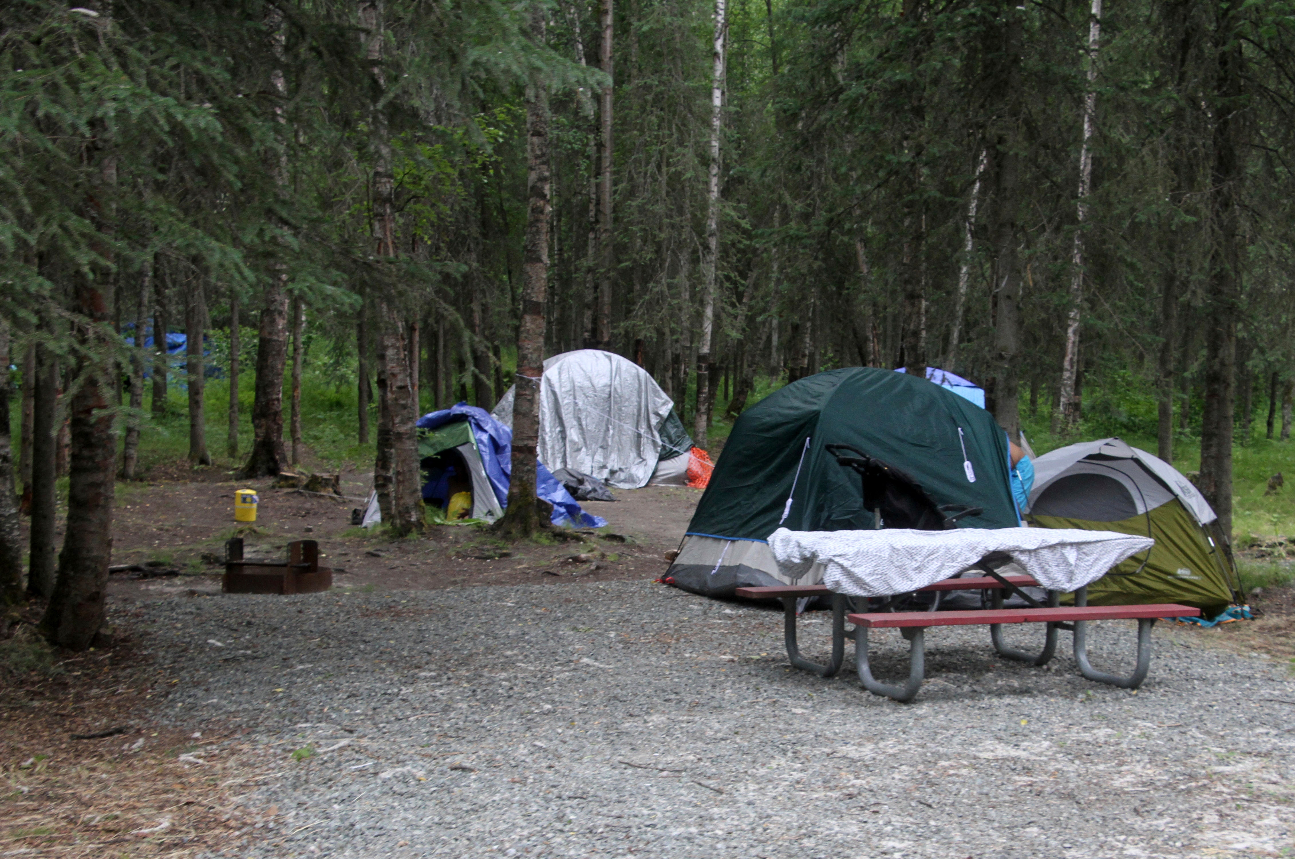 Alaska homeless camp shootout leads to man, officer injured