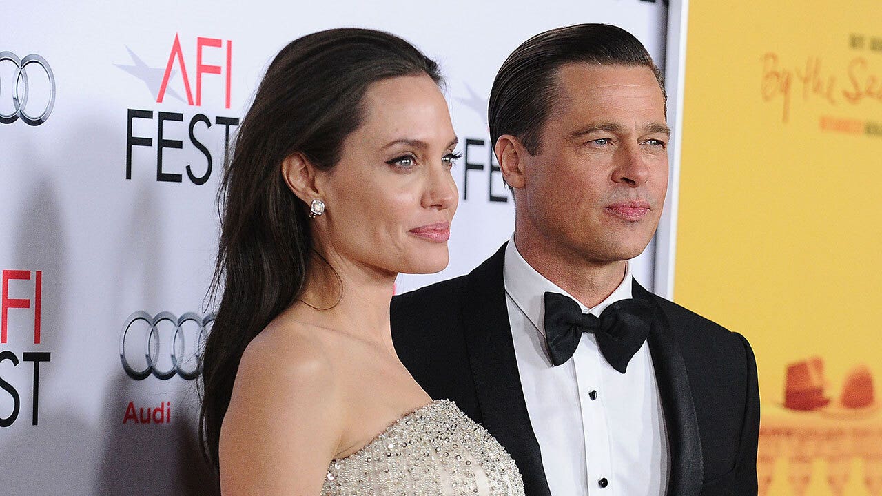 Angelina Jolie accuses Brad Pitt of choking one of their kids in explosive cross-complaint