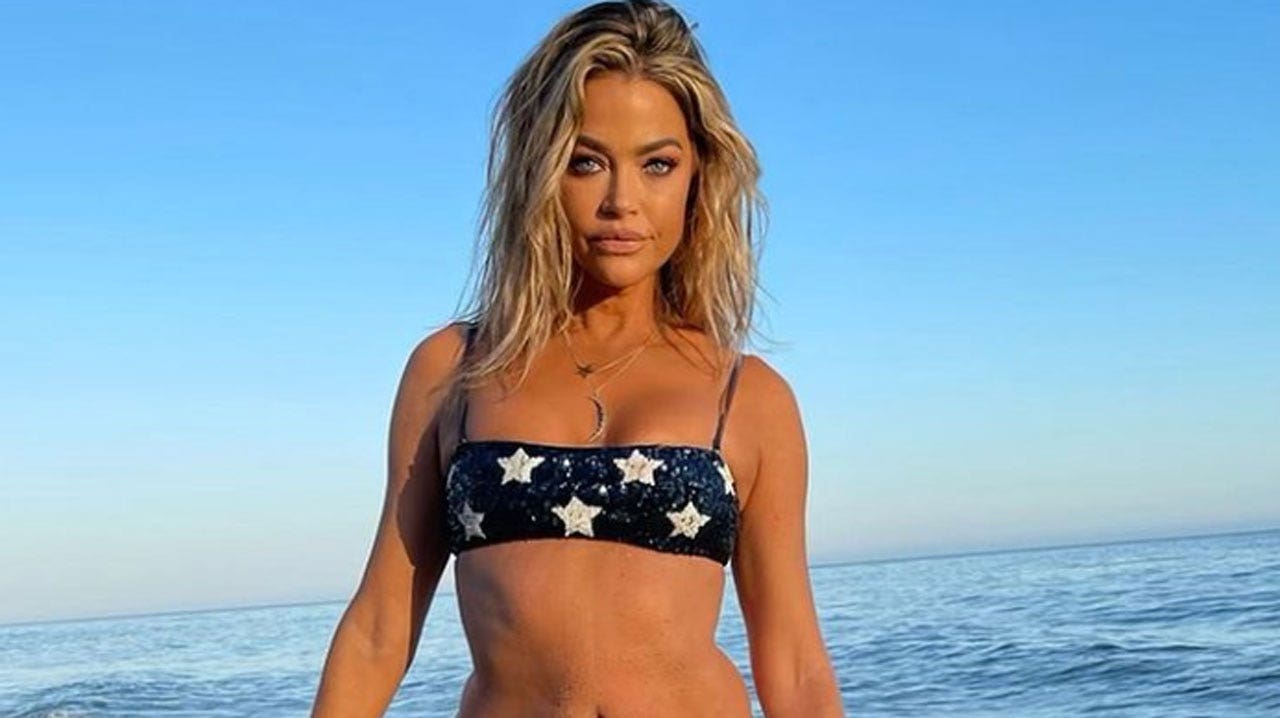 Denise Richards rocks patriotic bikini to celebrate July 4th on the beach after joining OnlyFans Fox News picture