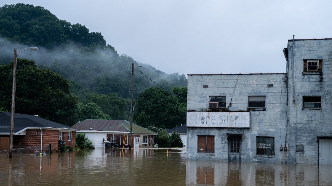 White House targets climate change as Joe Biden lands in Kentucky to survey flood damage