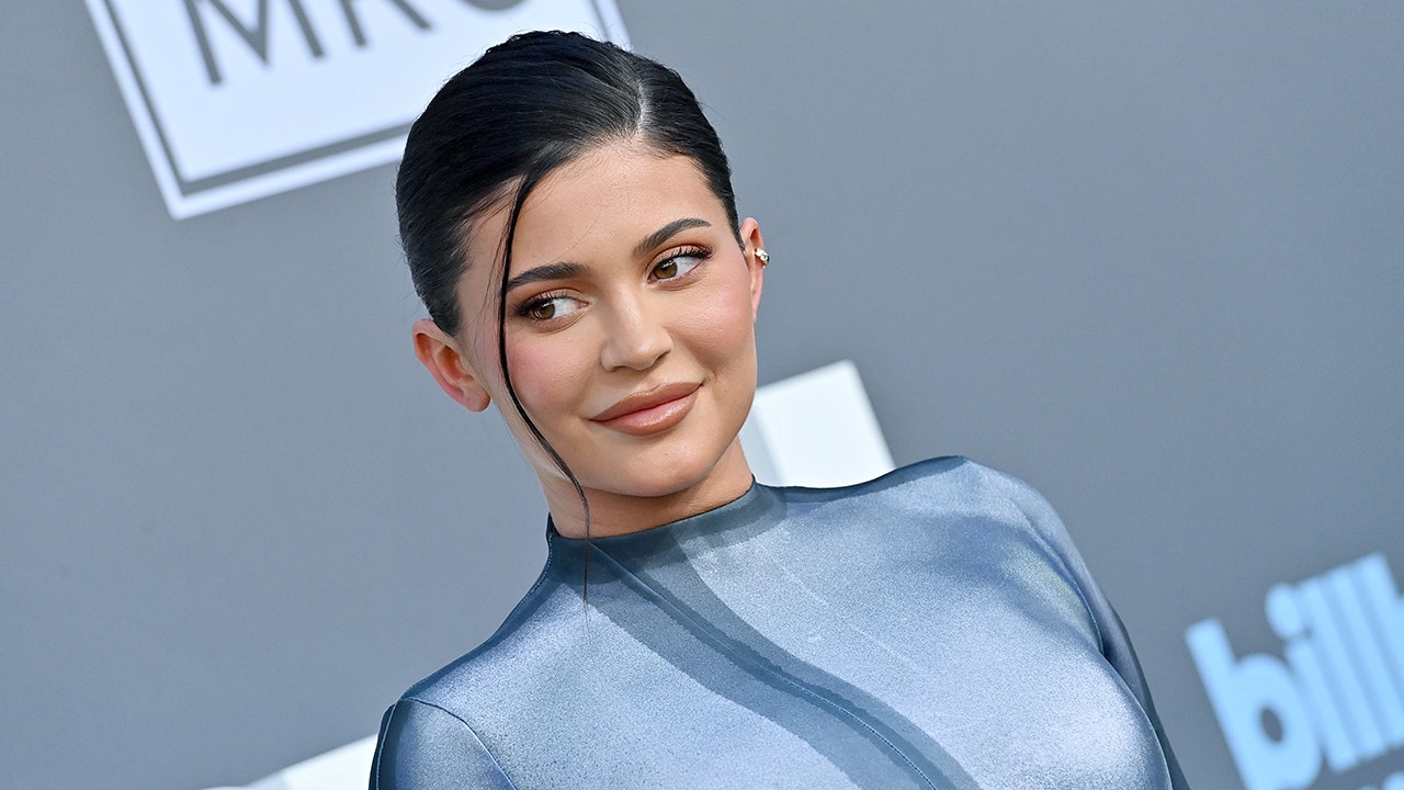 Kylie Jenner shares quick glance of son and daughter Stormi in new baby ad