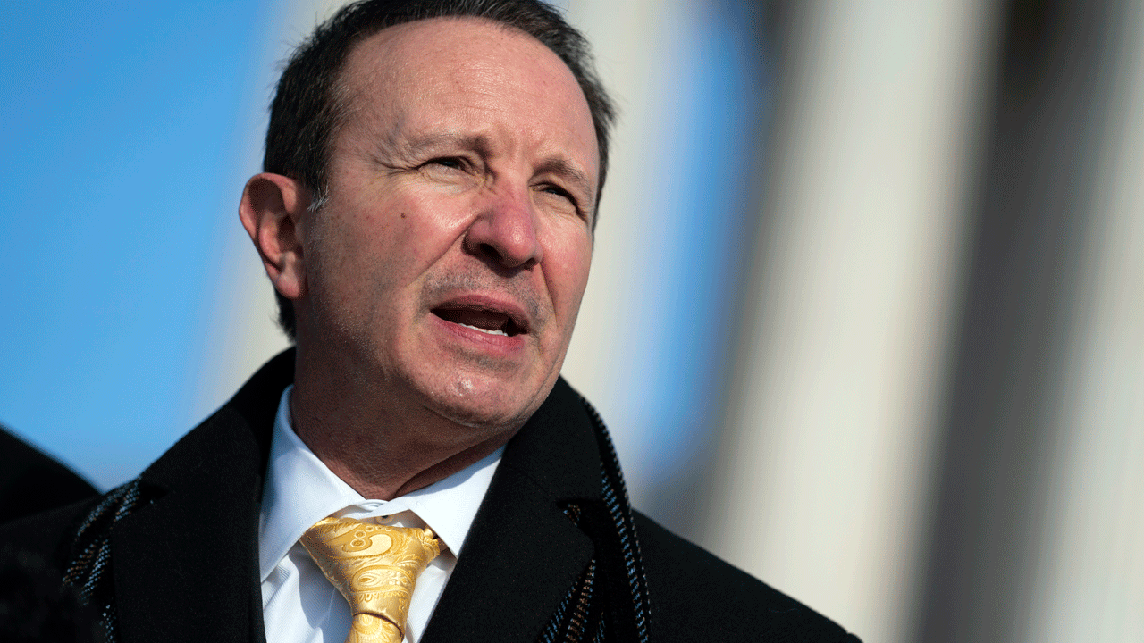 Louisiana Attorney General Jeff Landry talks to reporters outside the Supreme Court on Jan. 7, 2022, in Washington.