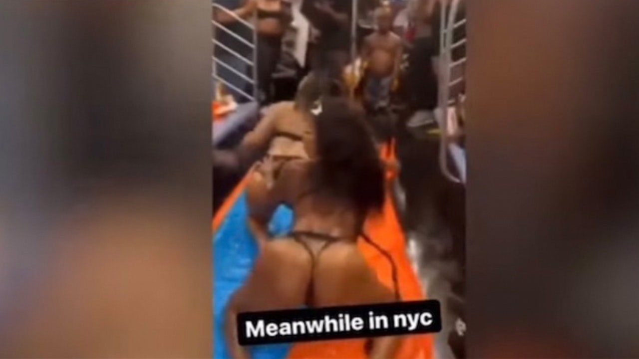 Raunchy, impromptu pool party with bikini-clad women takes over NYC subway car