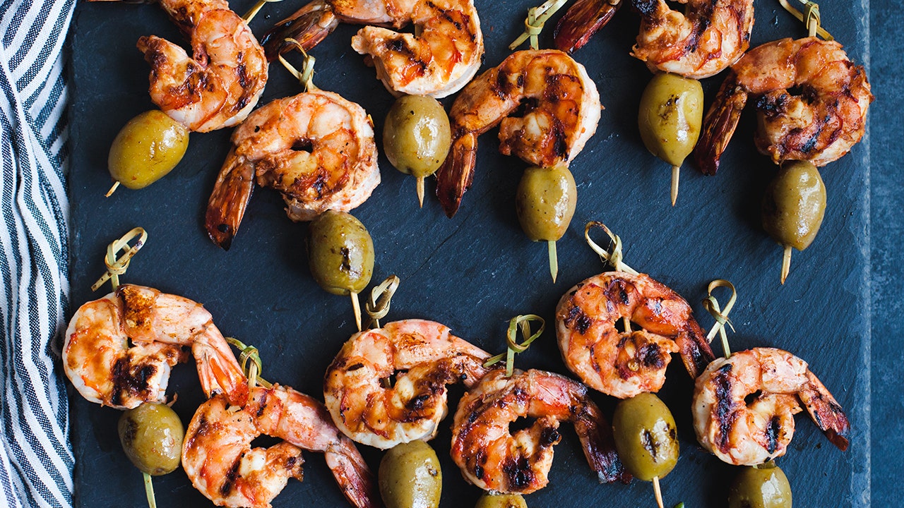 https://static.foxnews.com/foxnews.com/content/uploads/2022/07/Spicy-Shrimp-Olive-Skewers-3.jpg