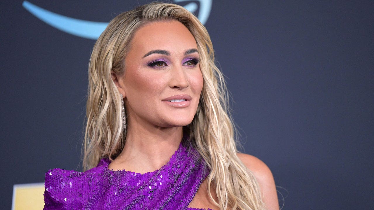 Brittany Aldean said she's an advocate for children following backlash. (Photo by BRIDGET BENNETT/AFP via Getty Images)