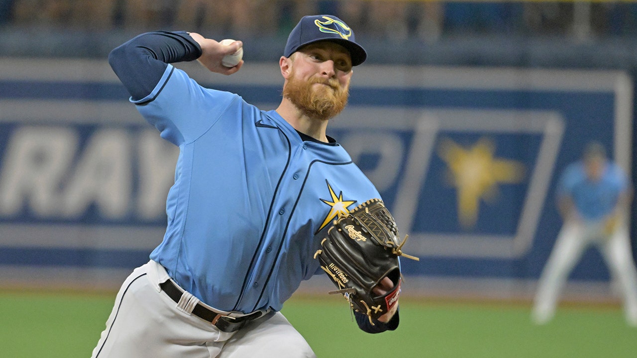 Drew Rasmussen of the Rays looks to break up a perfect game in the 9th inning