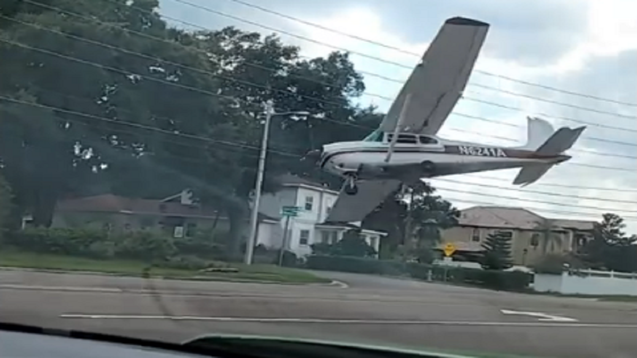 Stunning video shows Florida Cessna plane crashing onto Orlando road