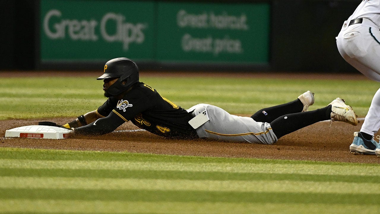 Pirates Rodolfo Castro’s phone falls out of his pocket during a third-base slide