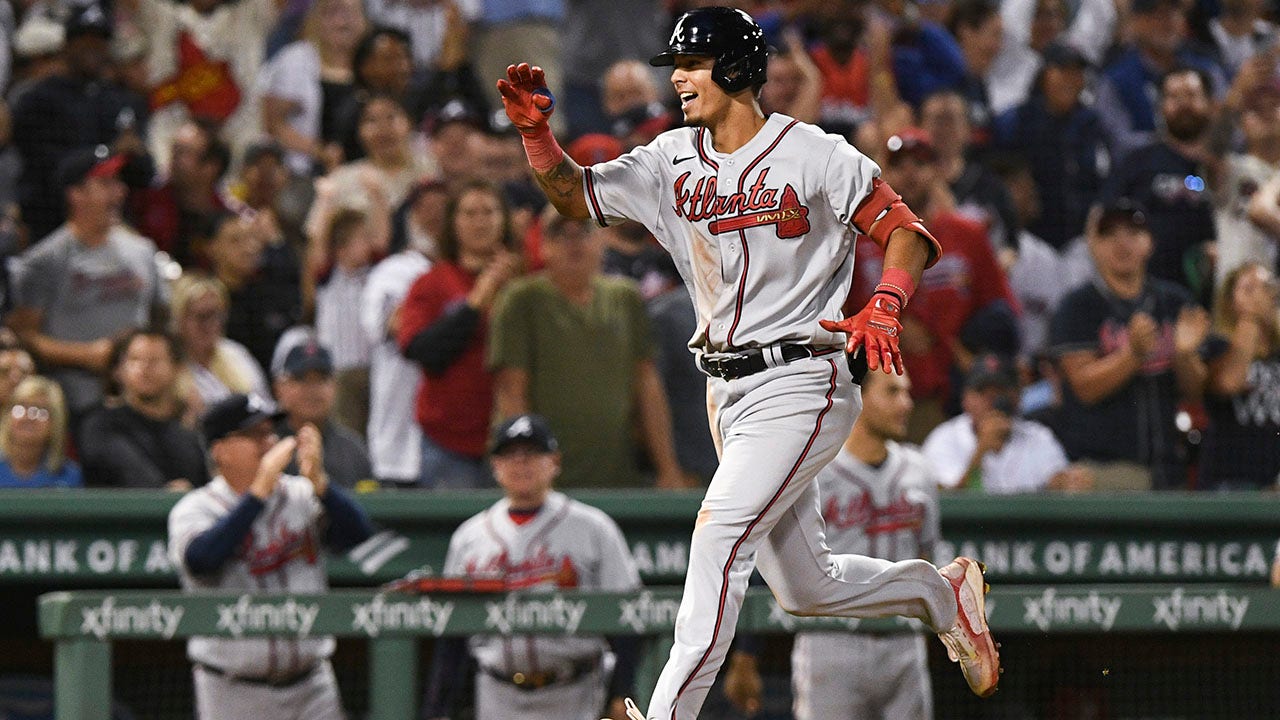 The Braves’ Vaughn Grissom homers over the Green Monster for the first big league hit
