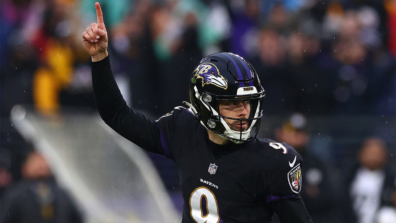 Baltimore Ravens place kicker Justin Tucker (9) celebrates with