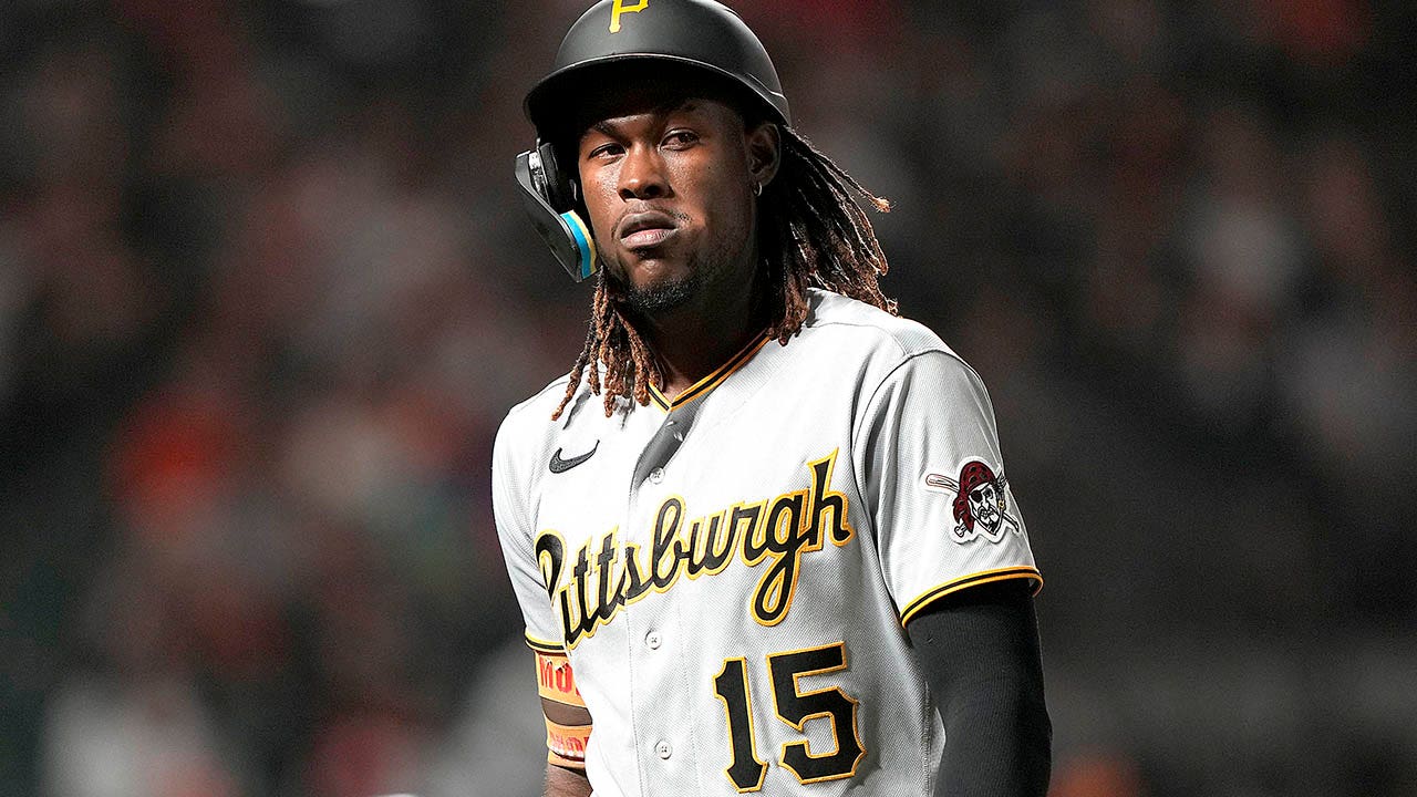 Pittsburgh Pirates' Oneil Cruz visits the dugout during a baseball