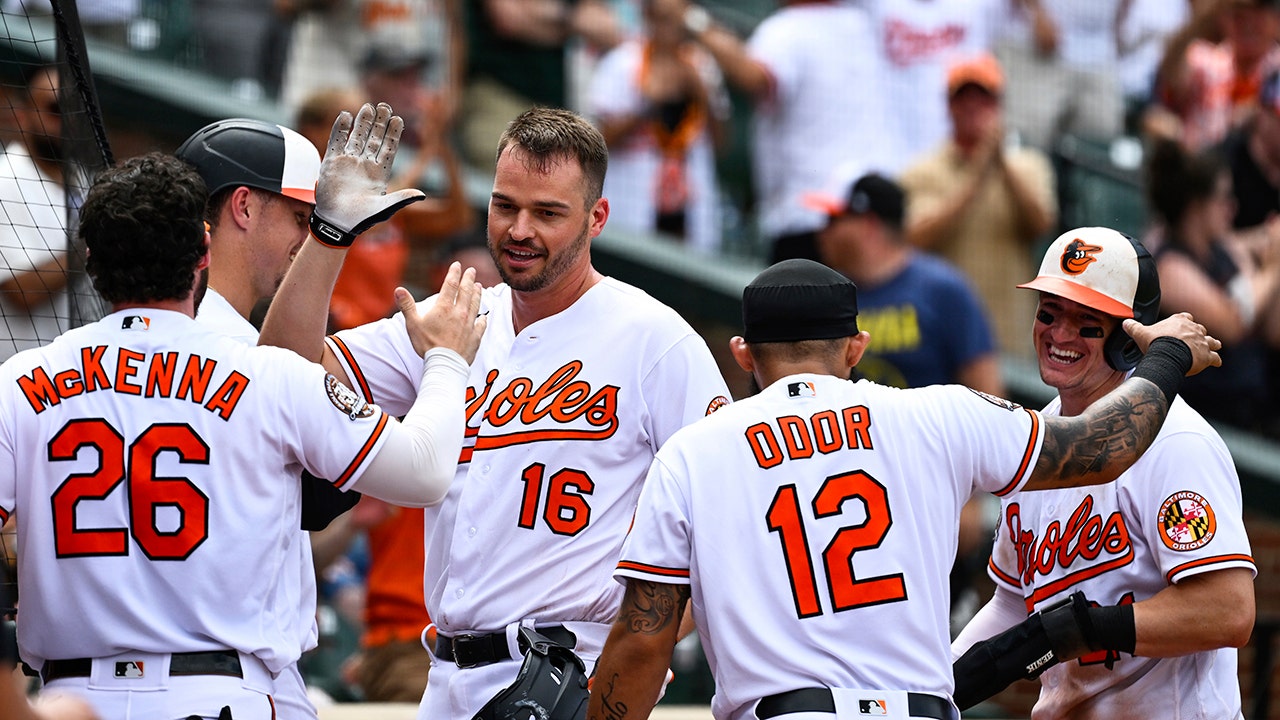 Baltimore Orioles celebrate the team's 1983 World Series Champs