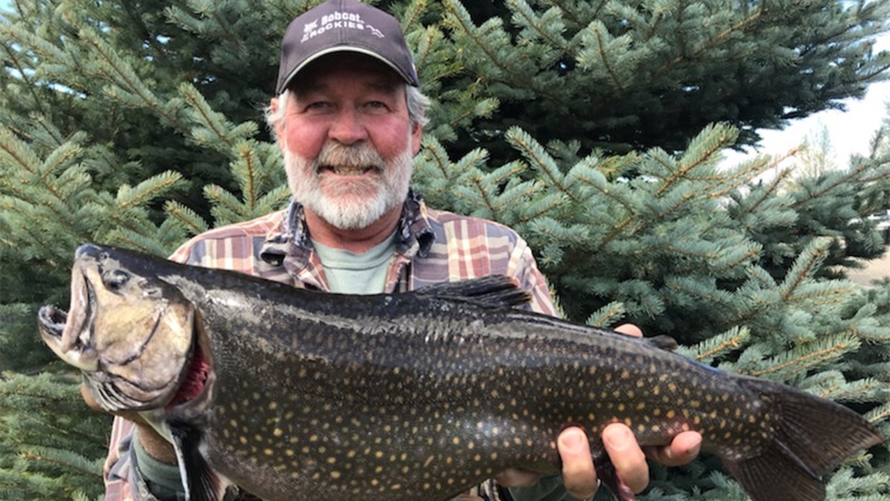 Tim Daniel, of Granby, Colorado, caught a 7.84-pound brook trout in May of this year, breaking Colorado's longest-standing fish record.  (Colorado Parks and Wildlife)