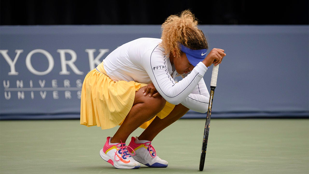 Naomi Osaka withdrew from the first round with a back injury