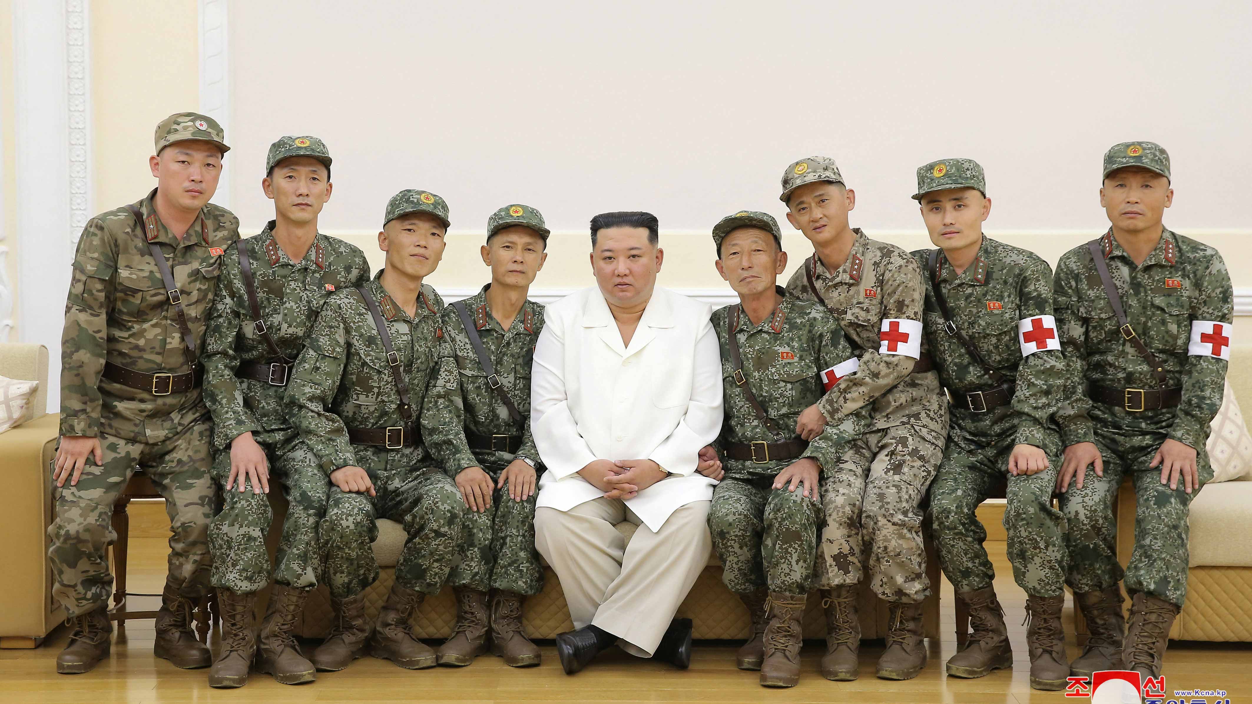 Kim Jung Un praises military medics after declaring victory over COVID last week