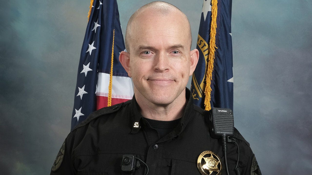 Georgia deputy dies after tree falls on patrol car, sheriff says