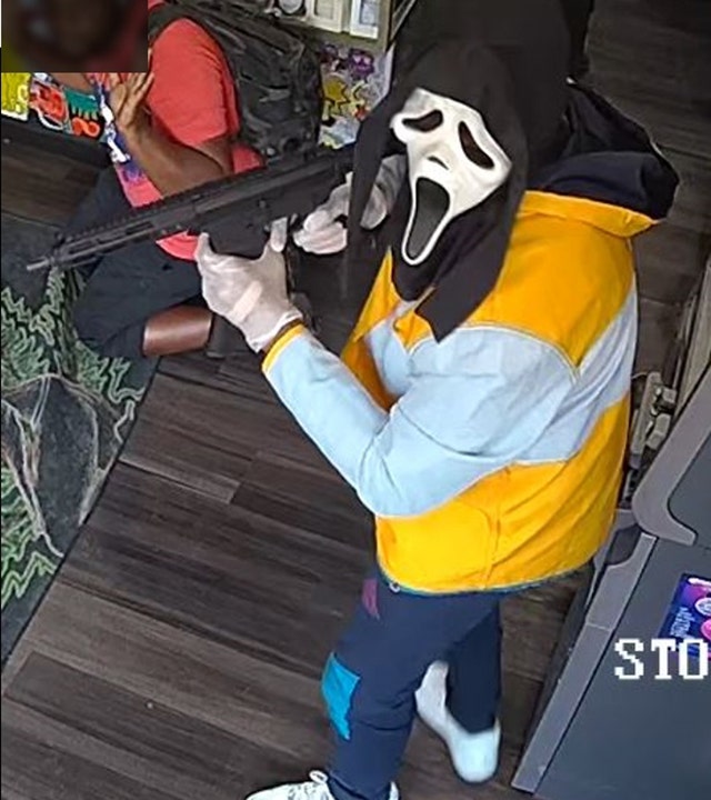 NYPD hunt ghoulish masked robbers caught on camera in armed stick-up