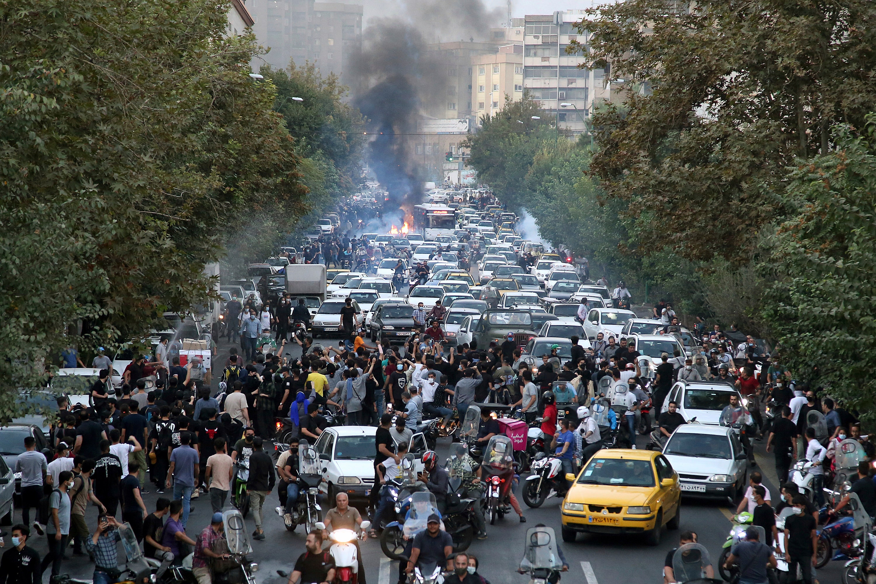 Iran protest: 9 dead in escalating unrest as demonstrators set fire to police stations, stab regime enforcer