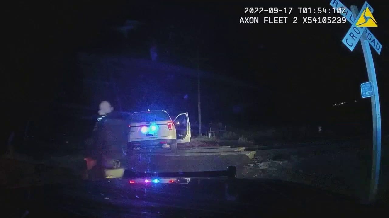 Video shows train hit Colorado officer’s car with suspect inside