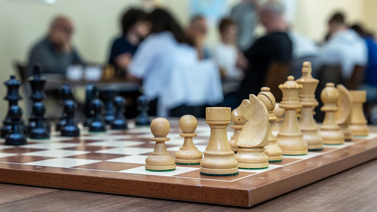 Chess world rattled by cheating allegations after 19-year-old beats one of  world's top players