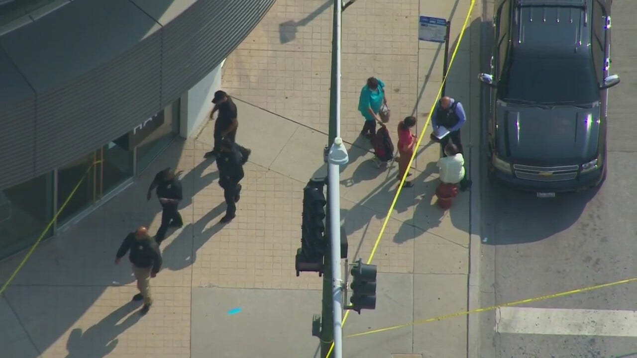 Chicago daylight robbery outside an Apple store thwarted by suburban mayor's armed security detail
