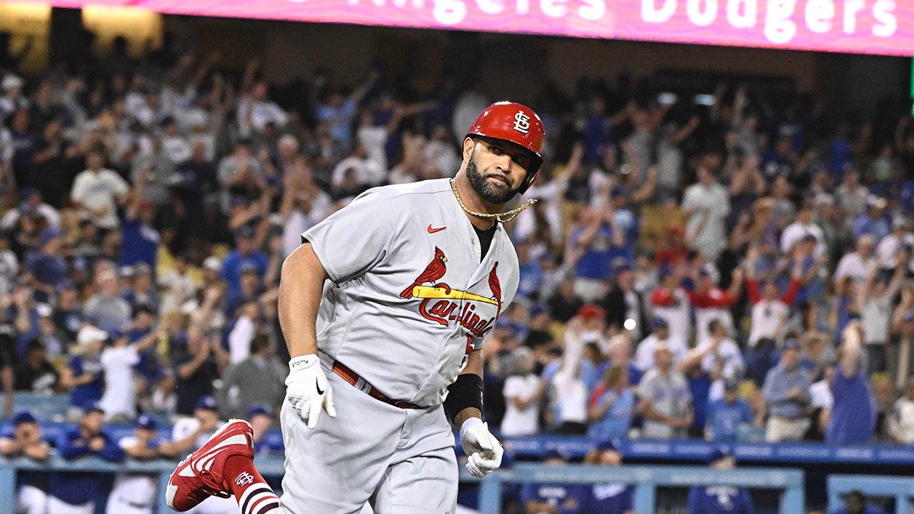 Albert Pujols makes emotional return to St. Louis