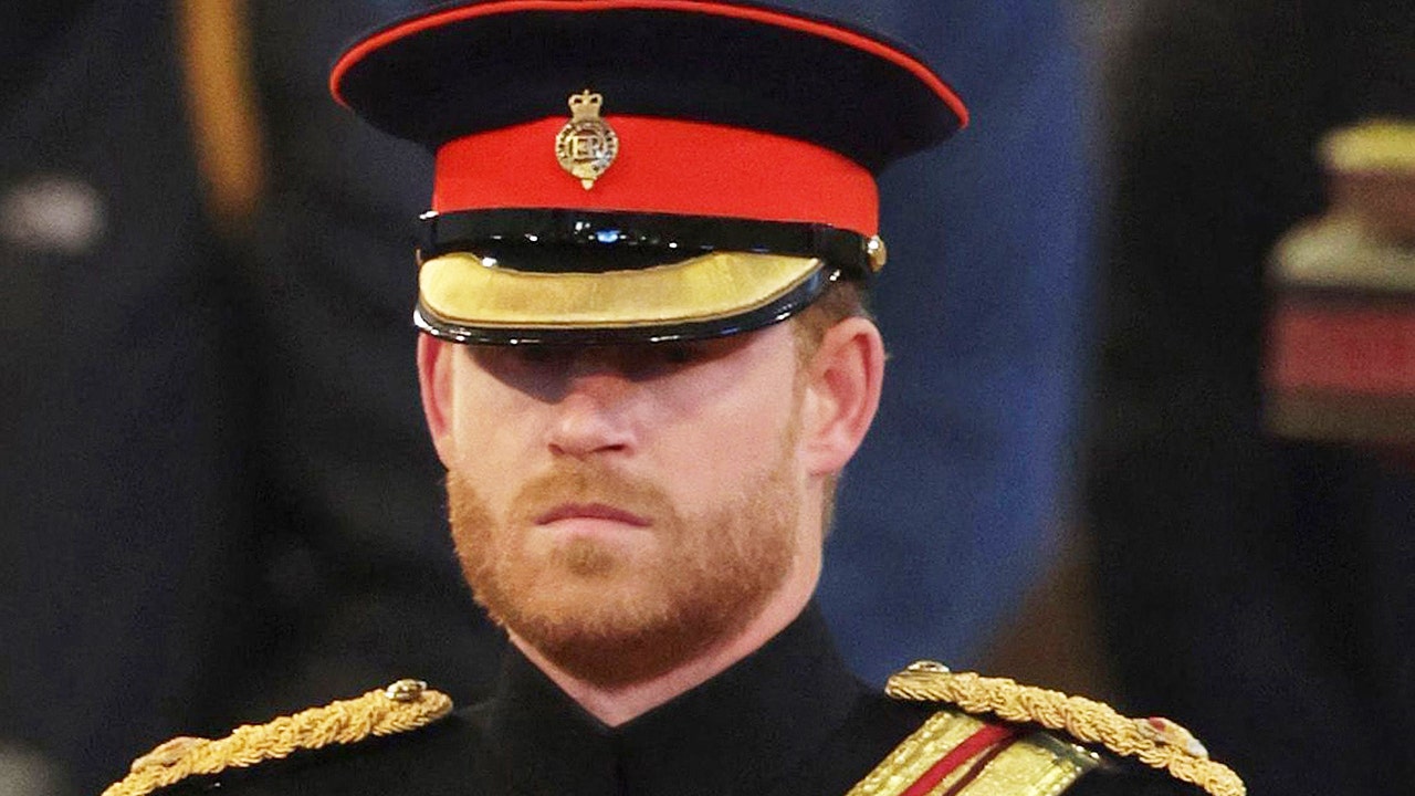 Royal snub? The real reason Prince Harry's uniform was missing the symbol honoring the Queen