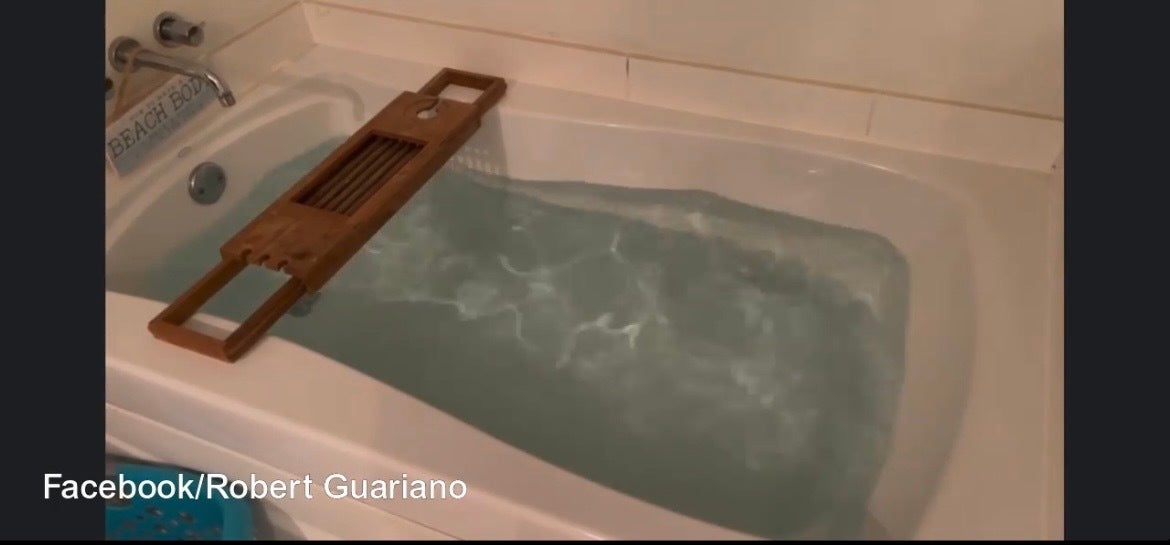 filling bathtub with water during storm