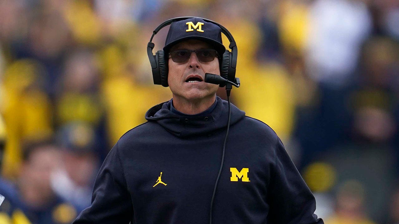 Jim Harbaugh ‘thinks’ he’ll stay with Michigan amid NFL rumors