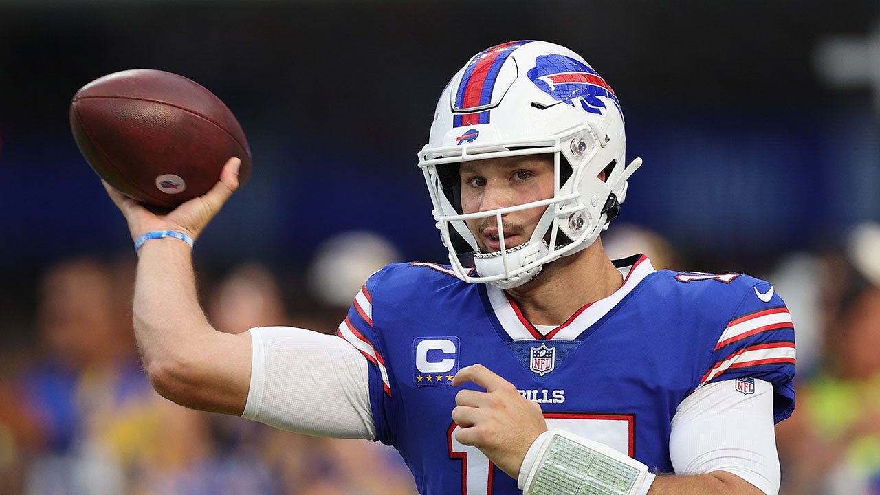 Buffalo Bills quarterback Josh Allen, left, celebrates a touchdown with  wide receiver Gabe Davis (13) during the first half of an NFL football game  against the Pittsburgh Steelers in Orchard Park, N.Y.