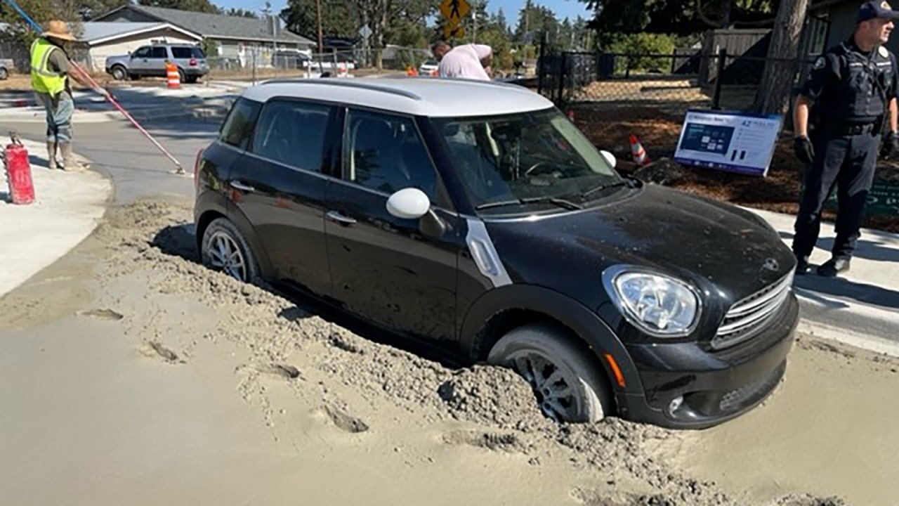 Washington woman gets stolen car stuck in fresh concrete with child and bottle of whiskey, officials say