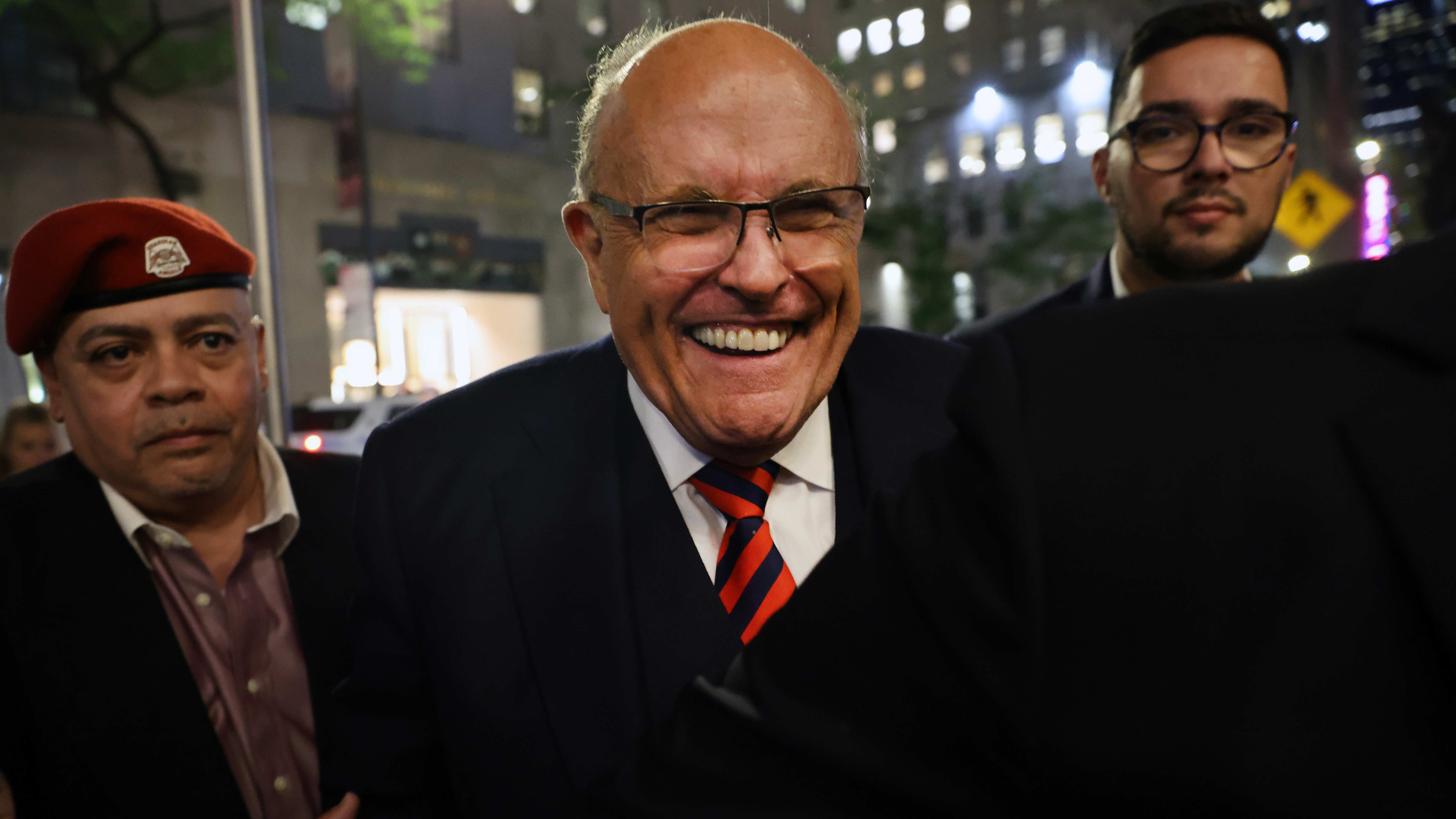Man who was charged for slapping Rudy Giuliani on the back files $2 million lawsuit