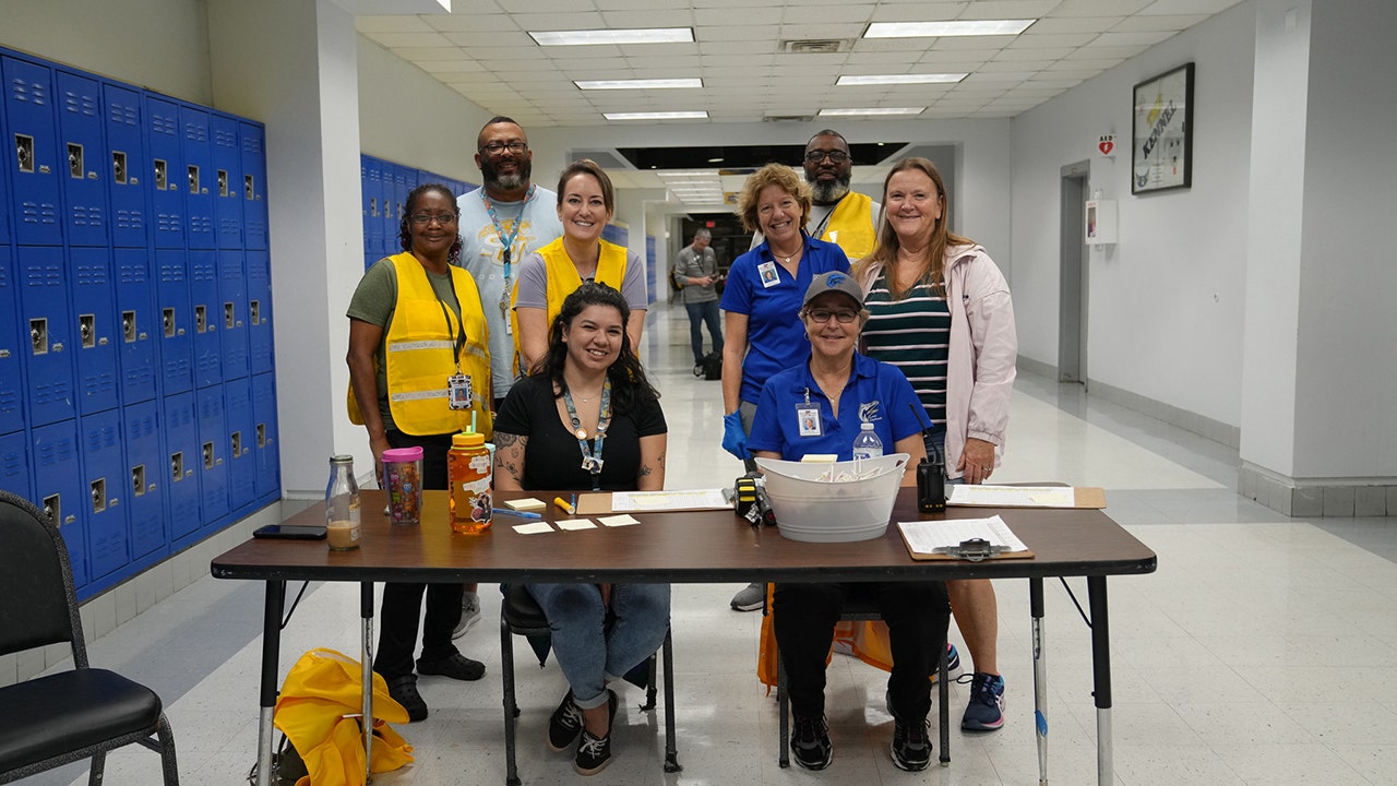 Volunteers wait for evacuees at a school-turned-shelter as Hurricane Ian hits Florida. (Seminole County Government)
