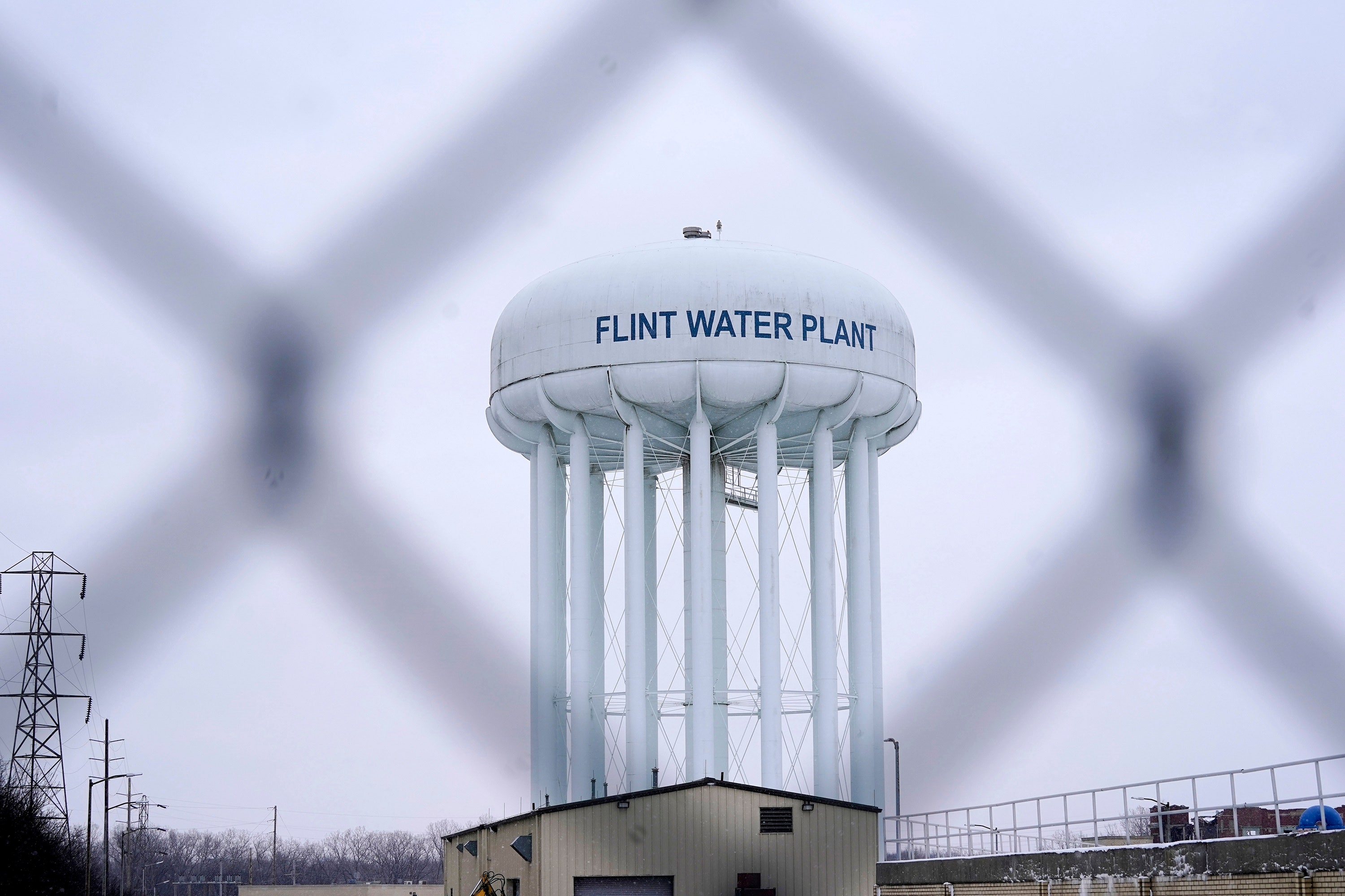 Flint water crisis Michigan judge tosses charges against 7 people