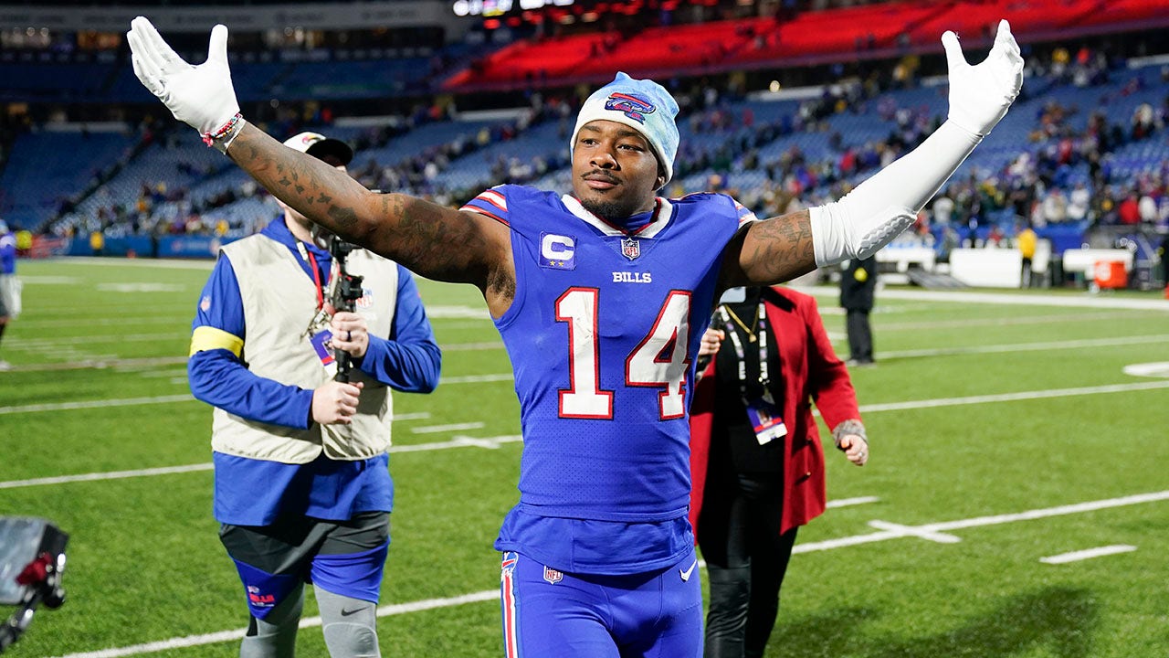 Buffalo Bills wide receiver Stefon Diggs (14) runs off the field