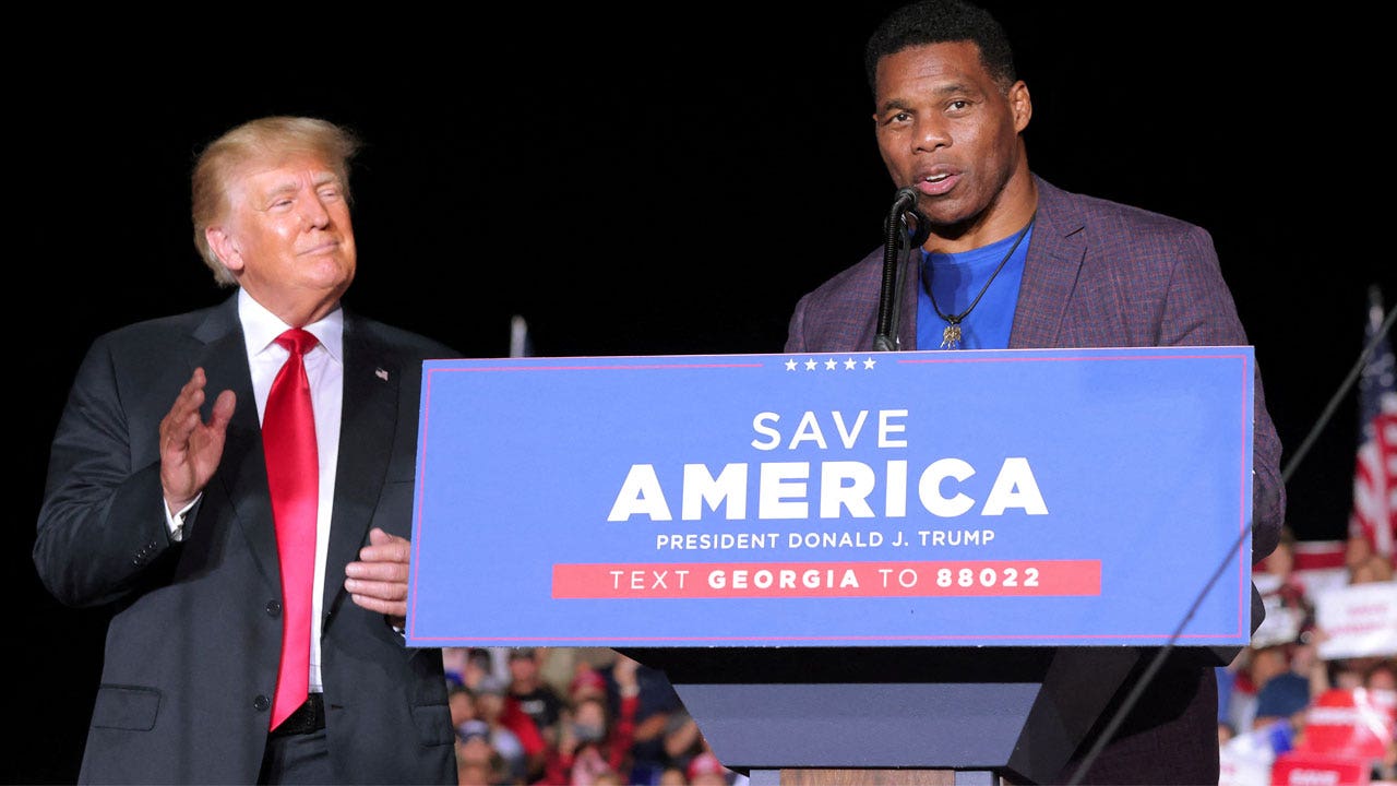 Donald Trump and Herschel Walker at rally