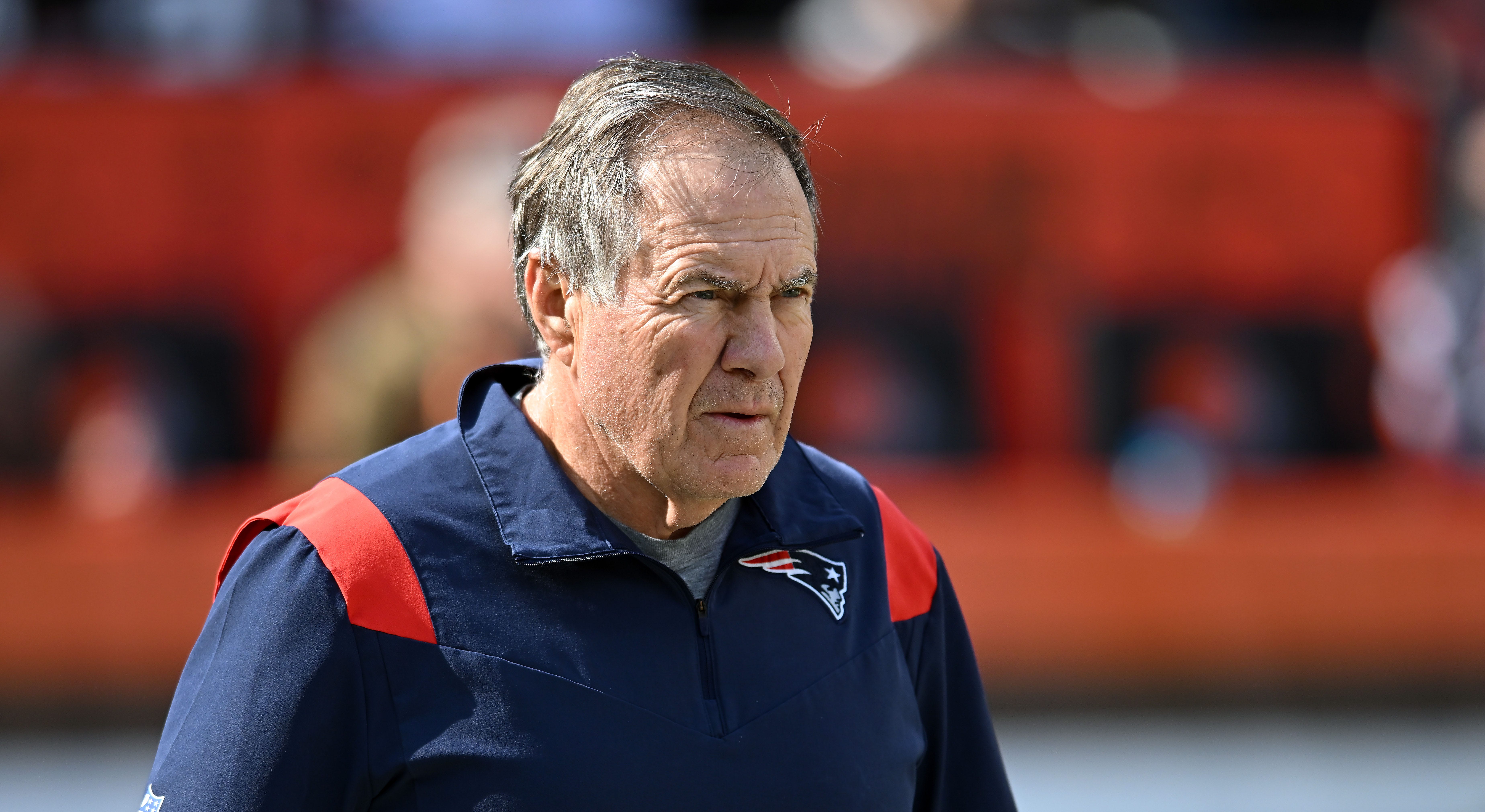 New England Patriots head coach Bill Belichick looks up to the replay  during the first half of an NFL football game against the Tennessee Titans,  Sunday, Nov. 28, 2021, in Foxborough, Mass. (