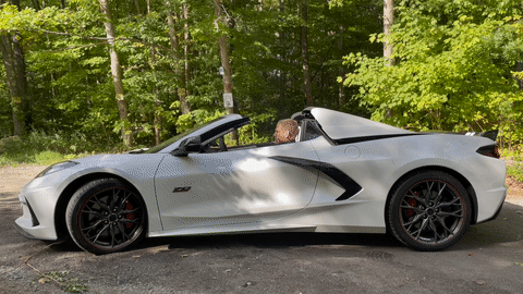 The Corvette Stingray Convertible's roof is stored over the engine when opened. (Operation shown at 3x speed.)