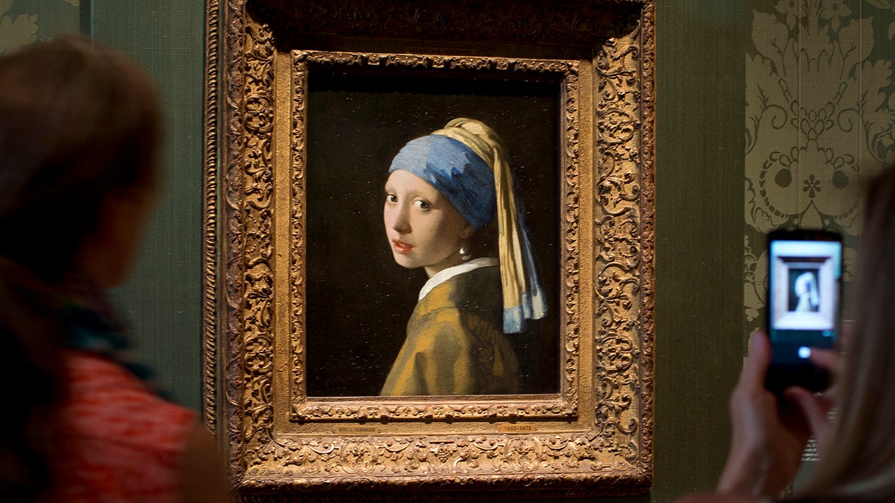 Anti-oil activists target ‘Girl with a Pearl Earring’ painting with glue, red liquid