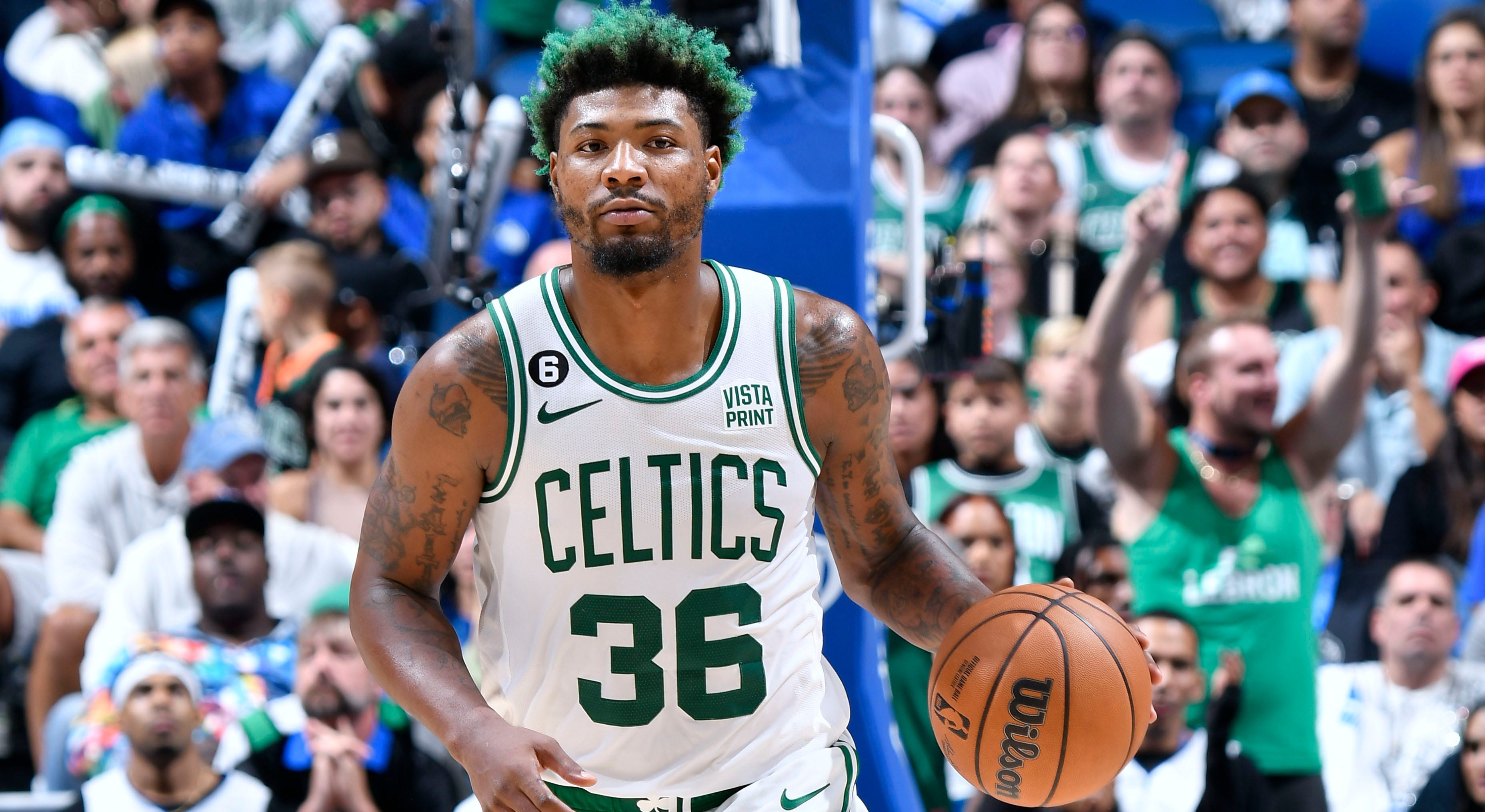 Celtics' Marcus Smart accidentally throws ball at ref's head twice ...
