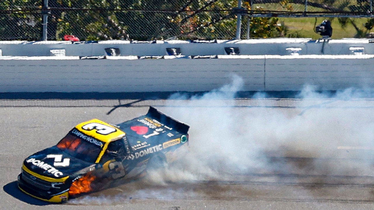 NASCAR driver airlifted to hospital after trying to climb out of burning car