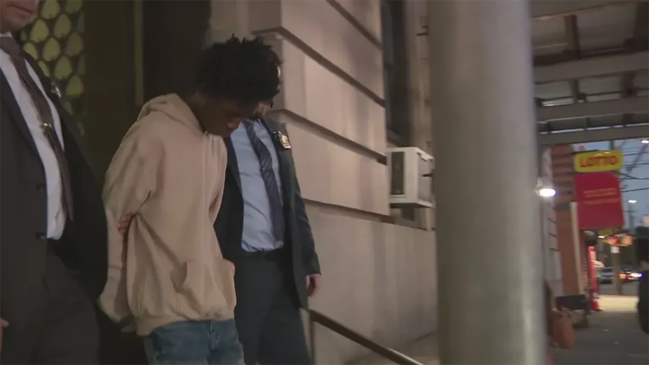 NYC suspect Keyondre Russell escorted from precinct after arrest for subway shooting of 15 year old