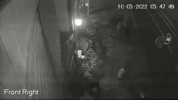 Surveillance video shows six people outside Bison Coffee House around 2:47 a.m. Oct. 5, 2022.