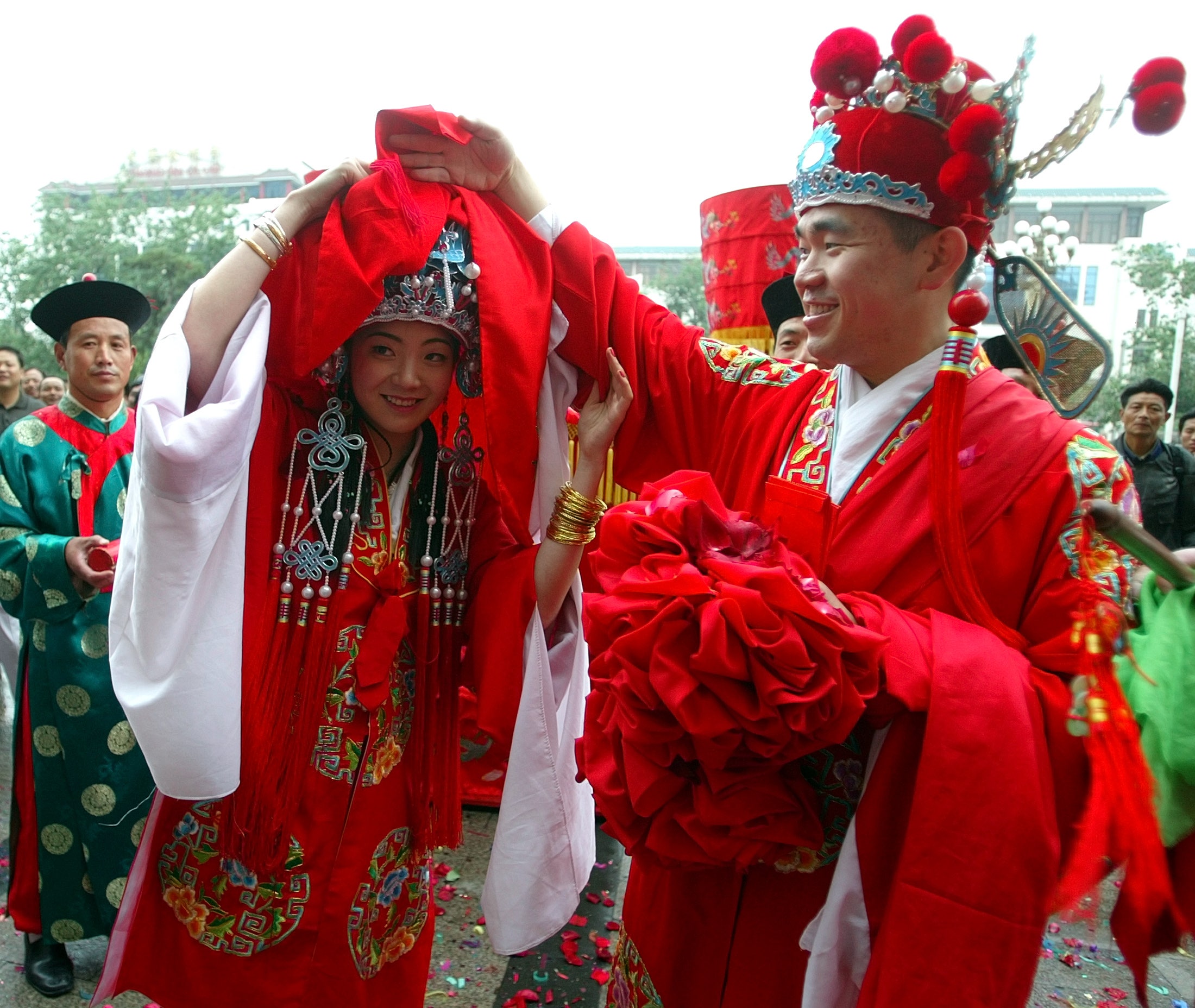 China's low birth rate being hit by sky rocketing costs associated with weddings