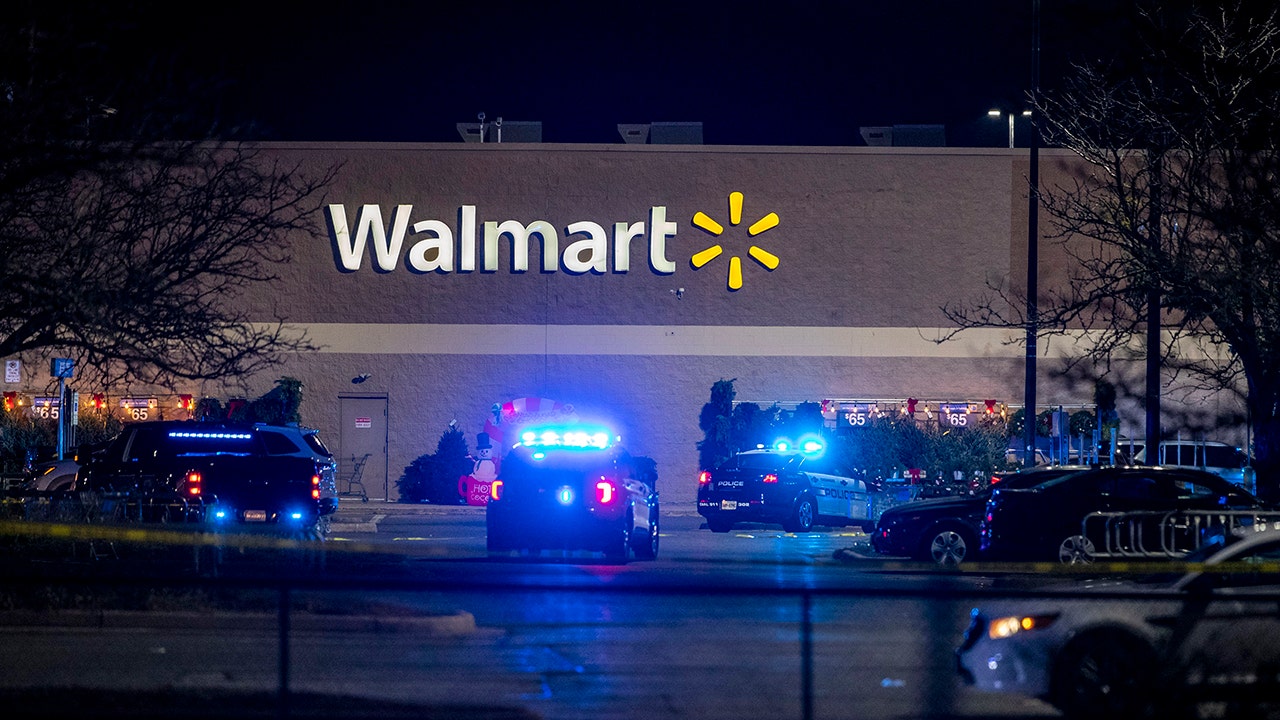 Police respond to the scene of a mass shooting at a Chesapeake, Va., Walmart Tuesday, Nov. 22, 2022. (Kendall Warner/The Virginian-Pilot via AP)