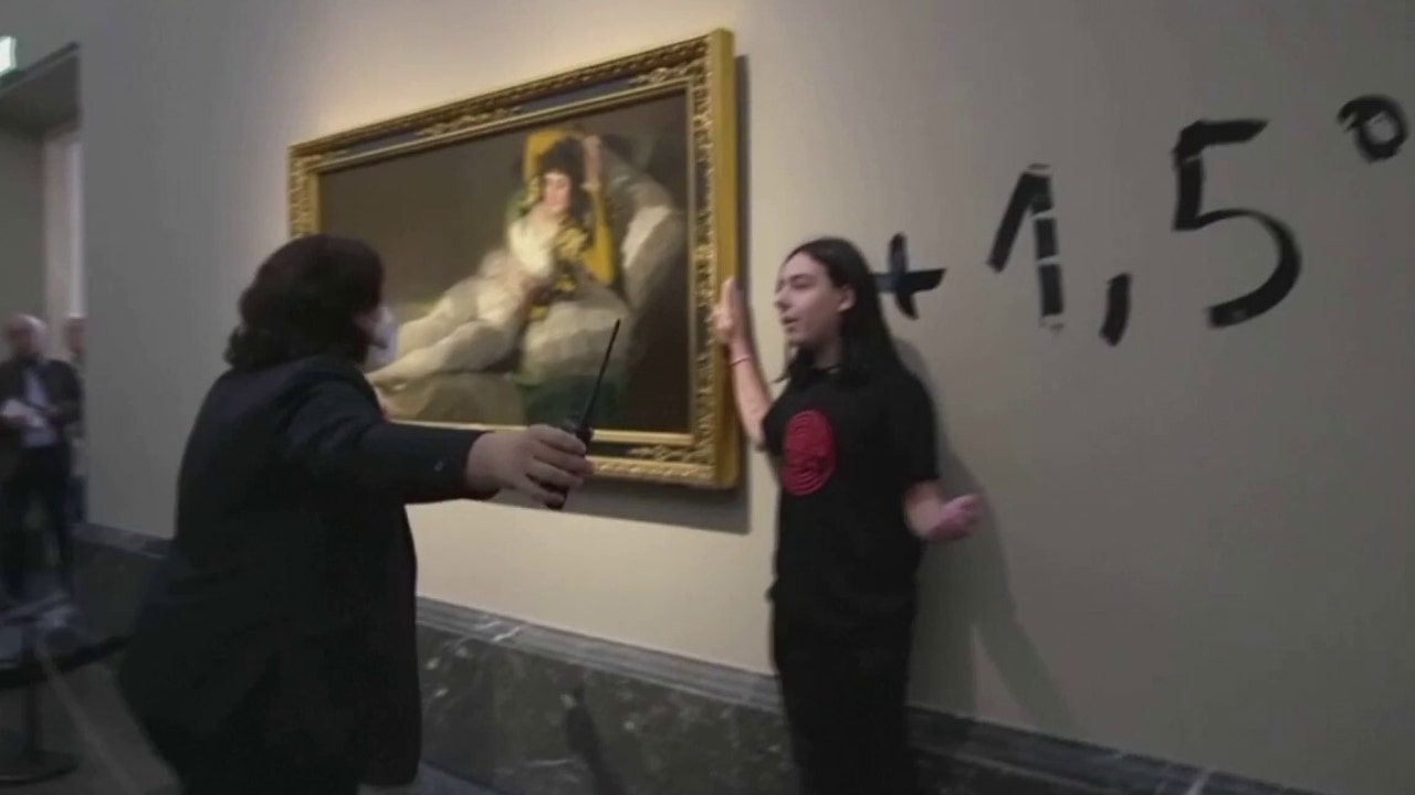 Climate activists glue hands to Goya paintings in Spain's Prado Museum