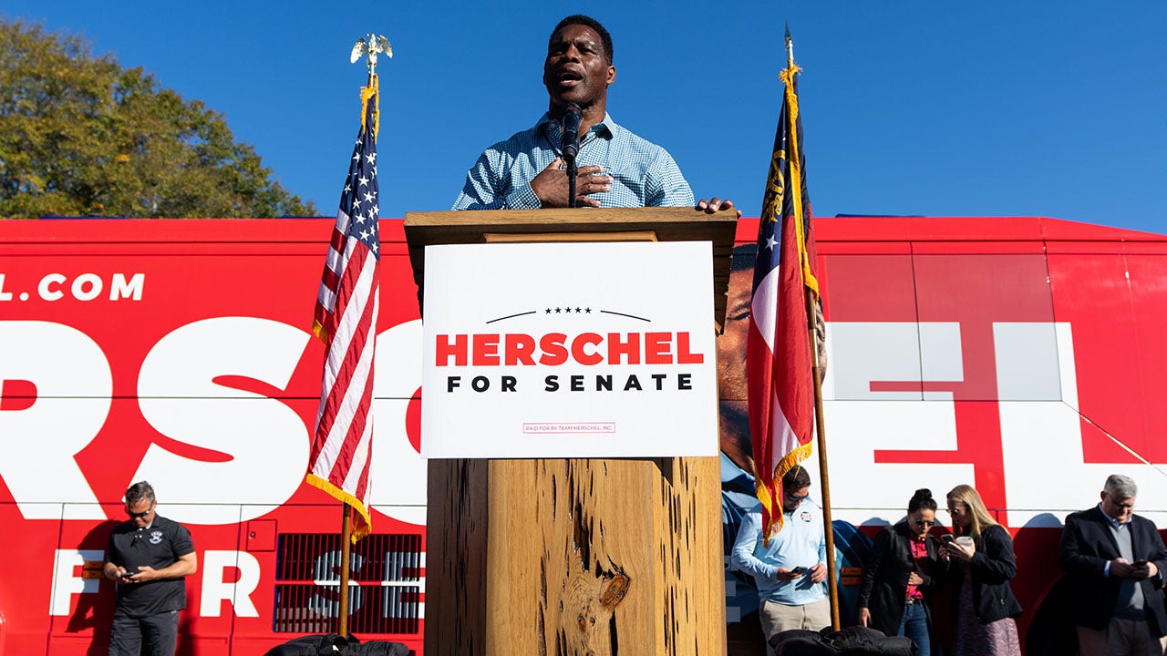 Herschel Walker calls out Warnock for campaign bus with Tennessee license plate ahead of game against Georgia