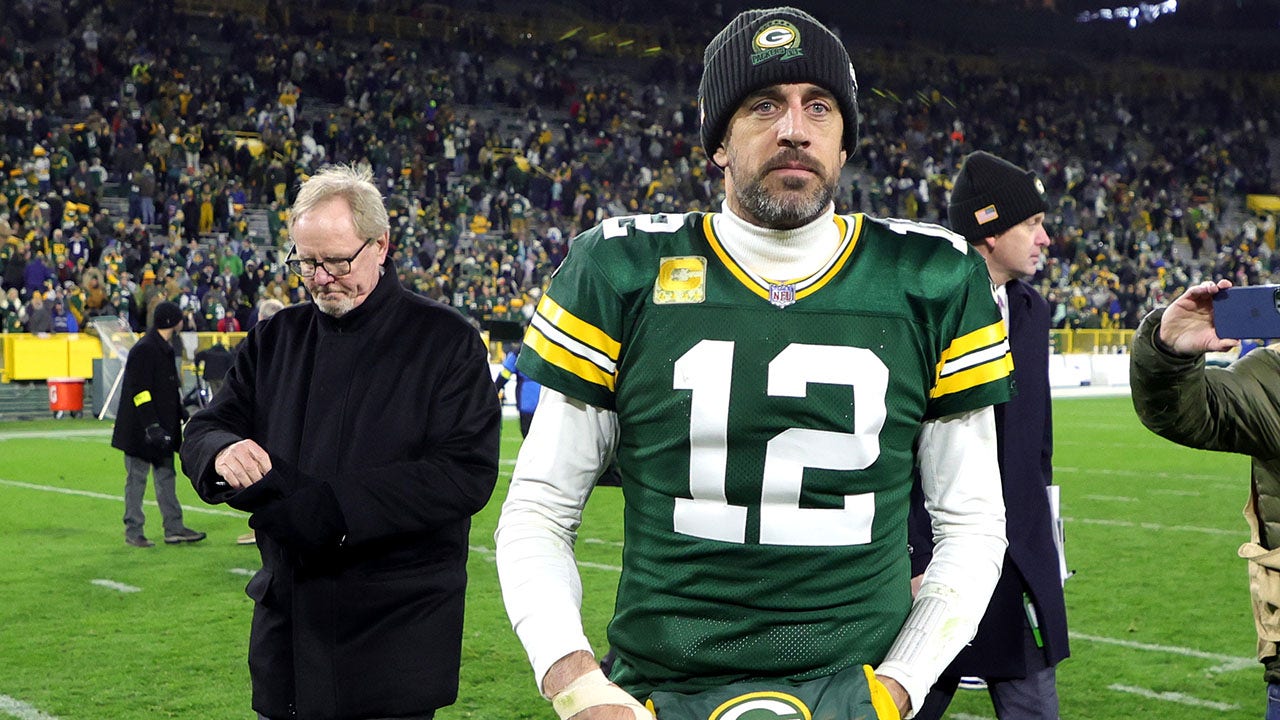 Green Bay Packers quarterback Aaron Rodgers (12) fist pumps the crowd as he  walks off the field after an NFL football game against the Houston Texans,  Sunday, Oct. 11, 2020, in Houston. (