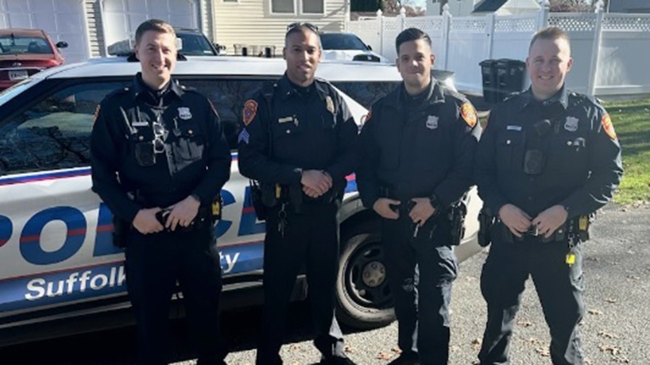 Sgt. Jon-Erik Negron (second from left, above) was one of four police officers to respond to a call about a woman who went into labor at her home. It was the fifth time in his career that Negron helped deliver a baby. (Suffolk County Police Department)