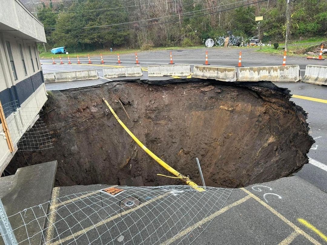West Virginia police department threatened to be swallowed up by large sinkhole